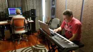 Dave Singer laying down keyboard tracks at 101rpm Studio in Northern VA.